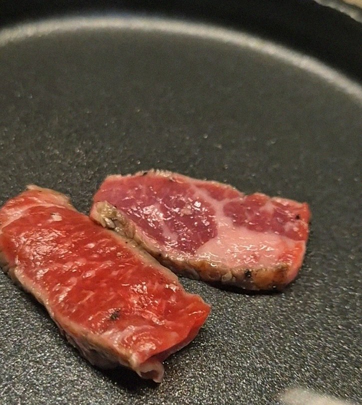 WOOARA Gwanghwamun · premium marbled Hanwoo beef presented before grilling