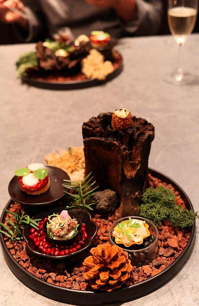 WOOHANA Jonggak · the signature Hanwoo showing — marbled beef cuts and caviar presented in a display chest