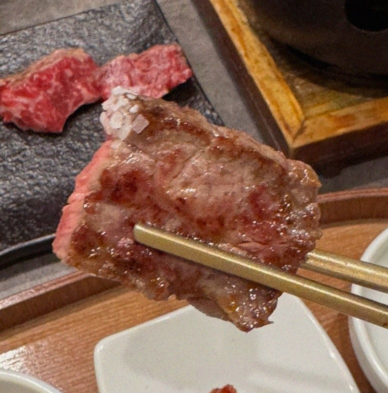 GOWOOGA Gwanghwamun · premium marbled Hanwoo beef presented before grilling