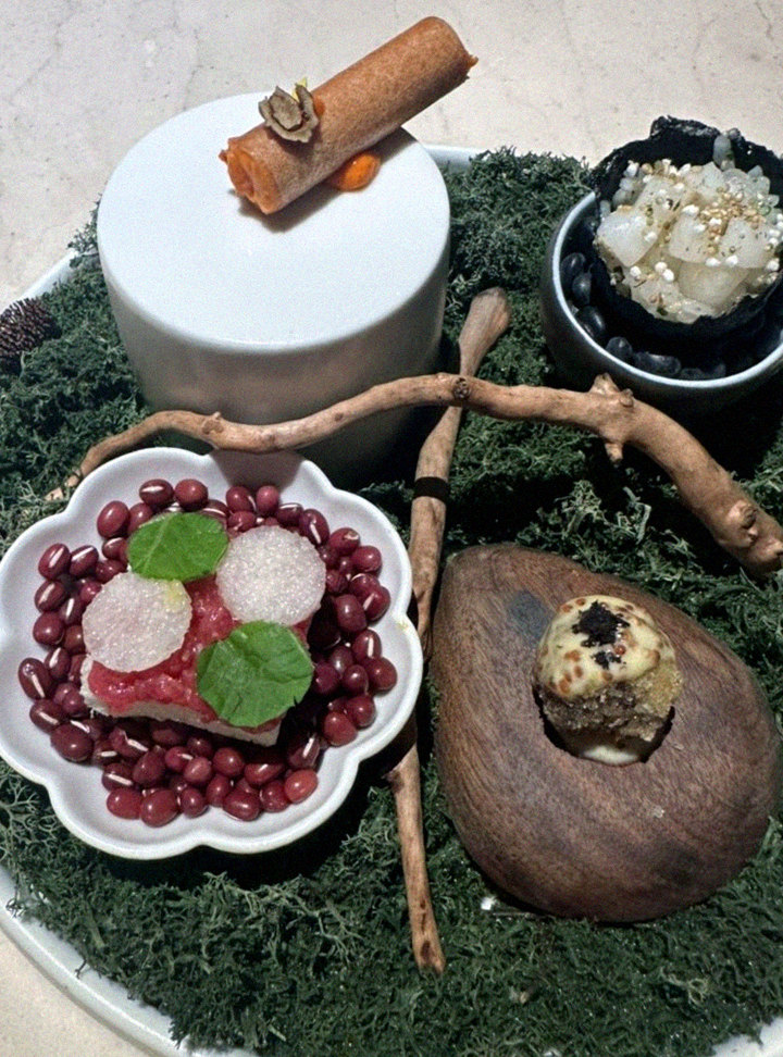 WOOARA Yeouido · the signature Hanwoo showing — marbled beef cuts and caviar presented in a display chest