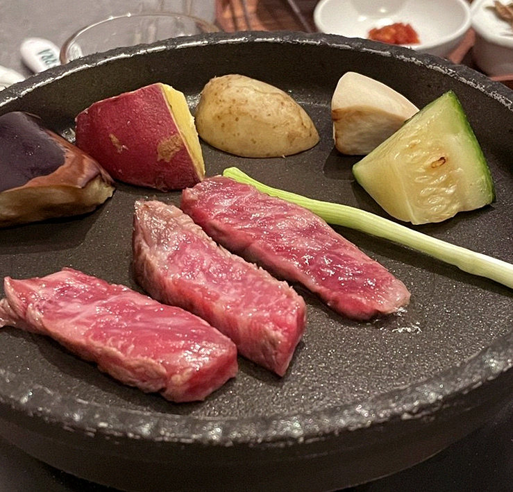 WOOHANA Jonggak · Hanwoo beef grilling over binchotan charcoal