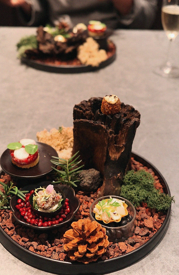 WOOHANA Jonggak · the signature Hanwoo showing — marbled beef cuts and caviar presented in a display chest