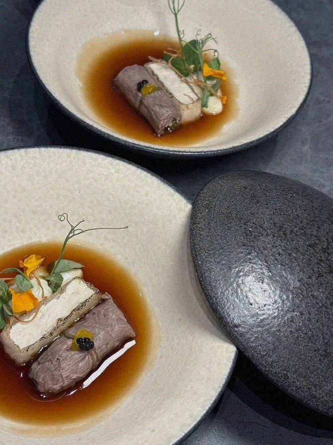 WOOHANA Jonggak · a plated course of Hanwoo beef