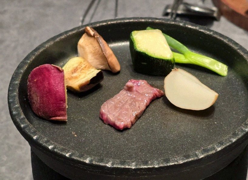 WOOHANA Jonggak · Hanwoo beef grilling over binchotan charcoal