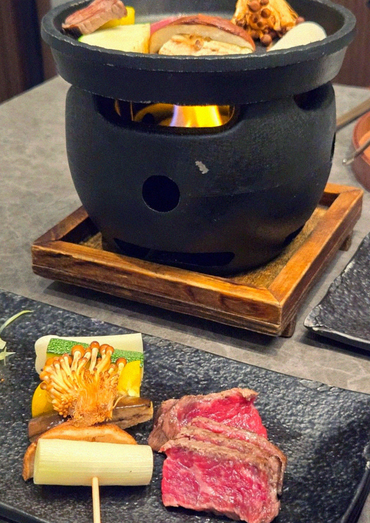 GOWOOGA Gwanghwamun · the signature Hanwoo showing — marbled beef cuts and caviar presented in a display chest