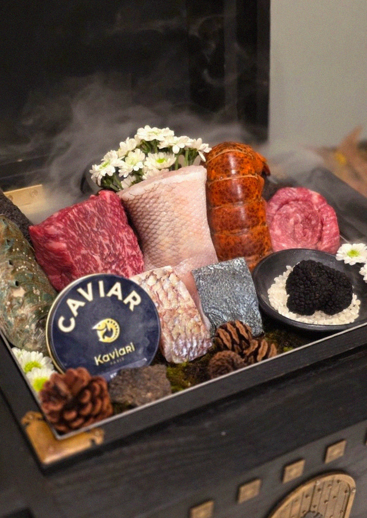 GOWOOGA Gwanghwamun · the signature Hanwoo showing — marbled beef cuts and caviar presented in a display chest