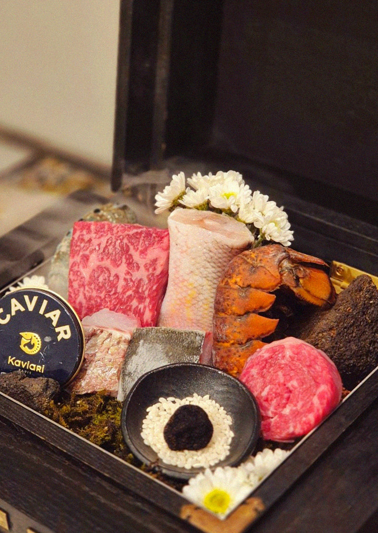 GOWOOGA Gwanghwamun · the signature Hanwoo showing — marbled beef cuts and caviar presented in a display chest
