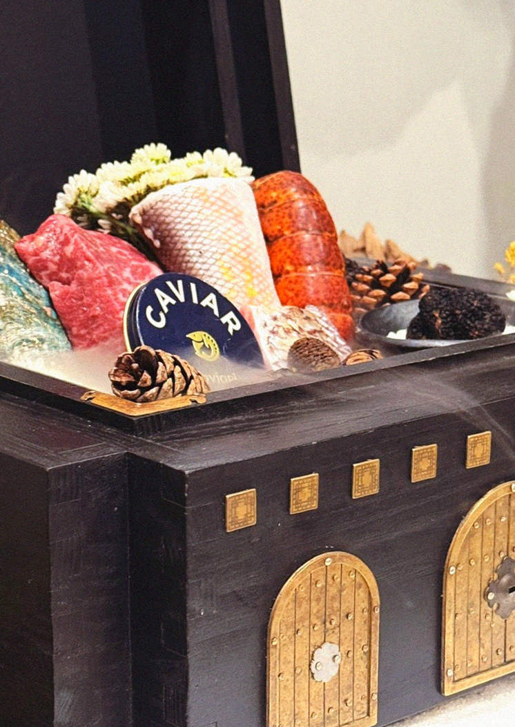 GOWOOGA Gwanghwamun · the signature Hanwoo showing — marbled beef cuts and caviar presented in a display chest