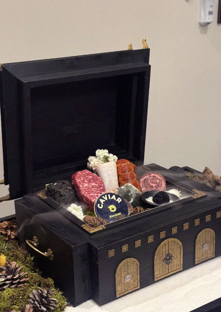 GOWOOGA Gwanghwamun · the signature Hanwoo showing — marbled beef cuts and caviar presented in a display chest