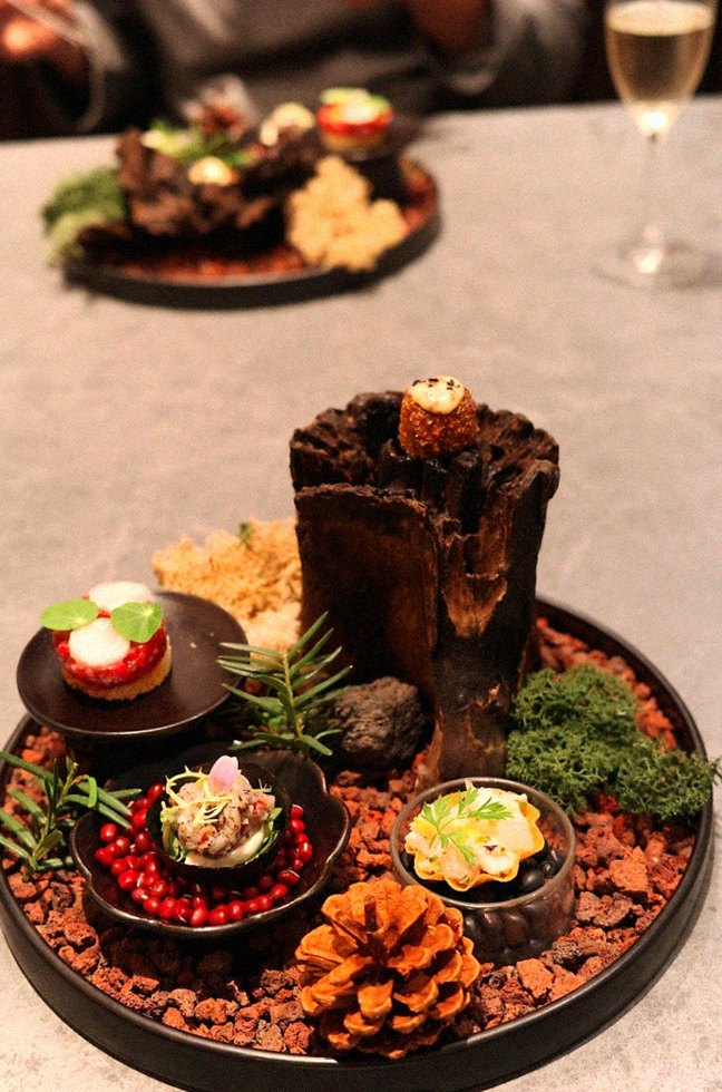 WOOHANA Jonggak · the signature Hanwoo showing — marbled beef cuts and caviar presented in a display chest