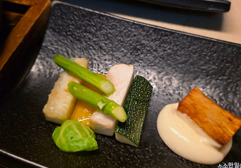 WOOARA Gwanghwamun · seafood course served alongside the beef