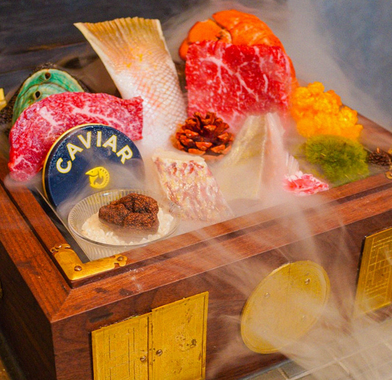 GOWOOGA Gangnam·Yeoksam · the signature Hanwoo showing — marbled beef cuts and caviar presented in a display chest
