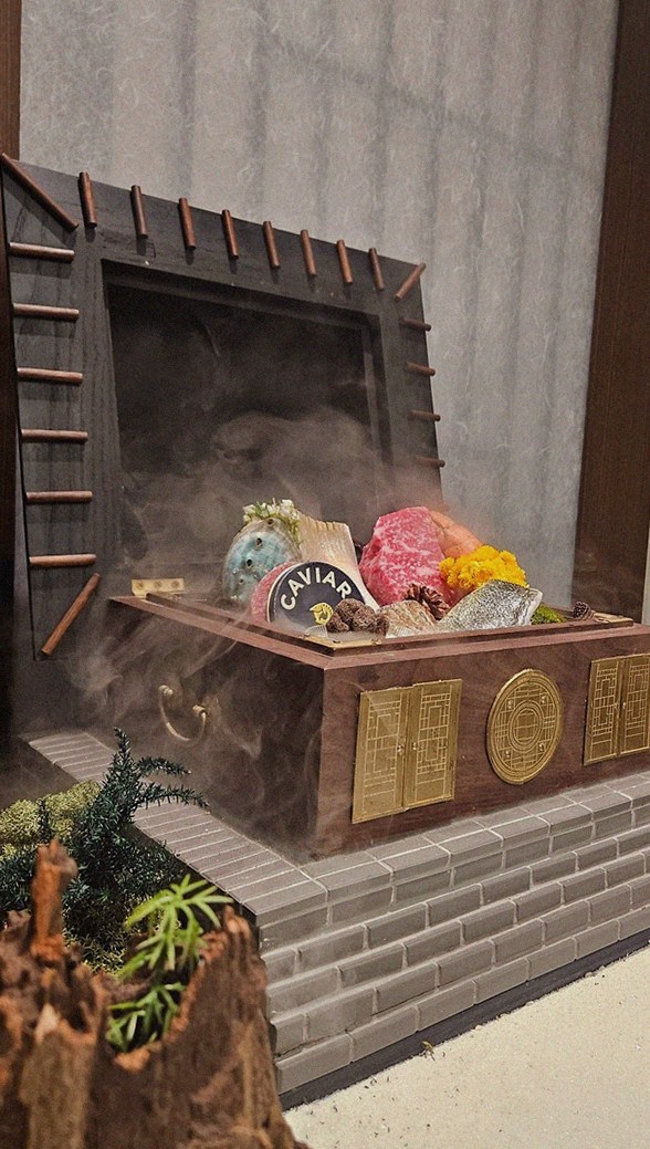 GOWOOGA Gangnam·Yeoksam · the signature Hanwoo showing — marbled beef cuts and caviar presented in a display chest