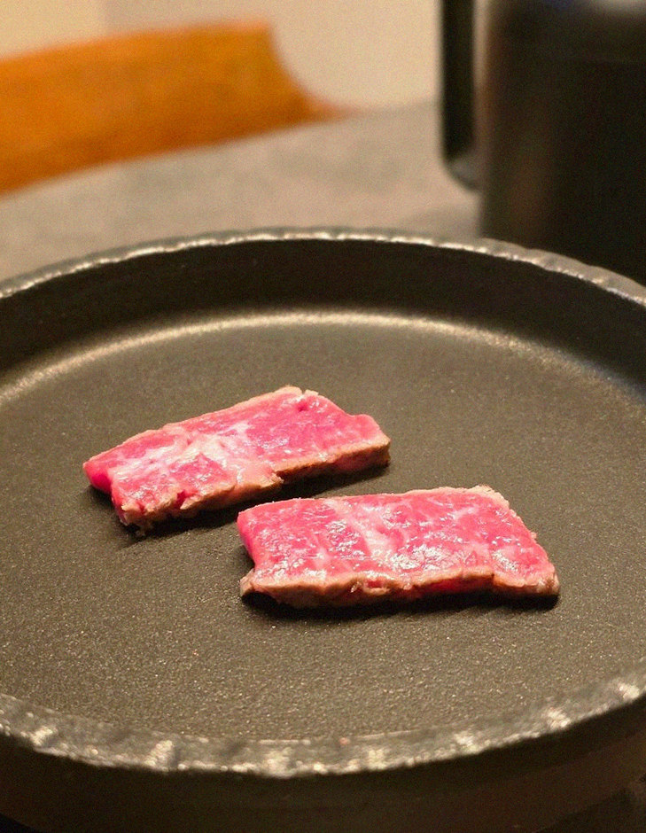 GOWOOGA Yeouido · premium marbled Hanwoo beef presented before grilling