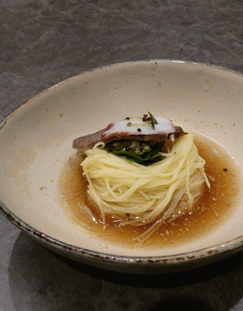 GOWOOGA Gwanghwamun · a plated course of Hanwoo beef