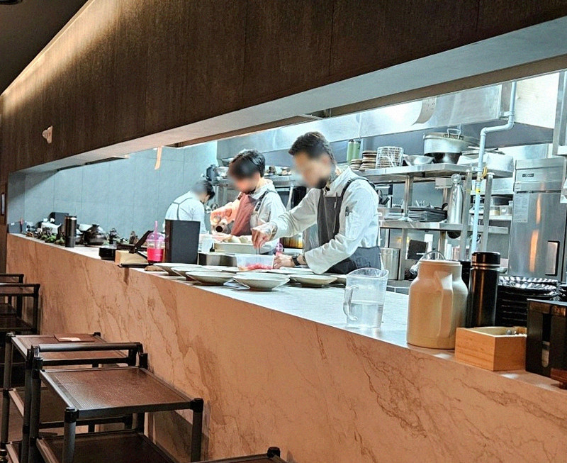 WOOHANA Jonggak · seafood course served alongside the beef