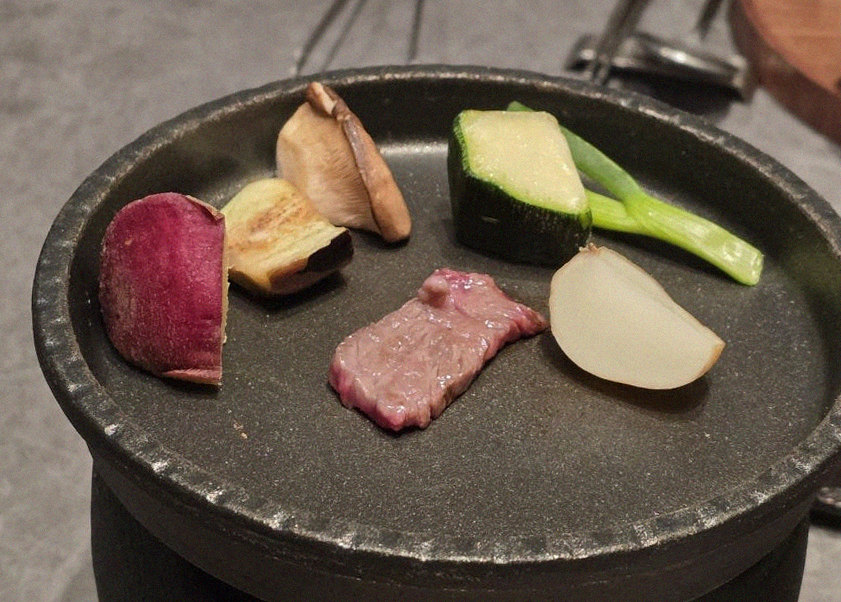 WOOHANA Jonggak · Hanwoo beef grilling over binchotan charcoal