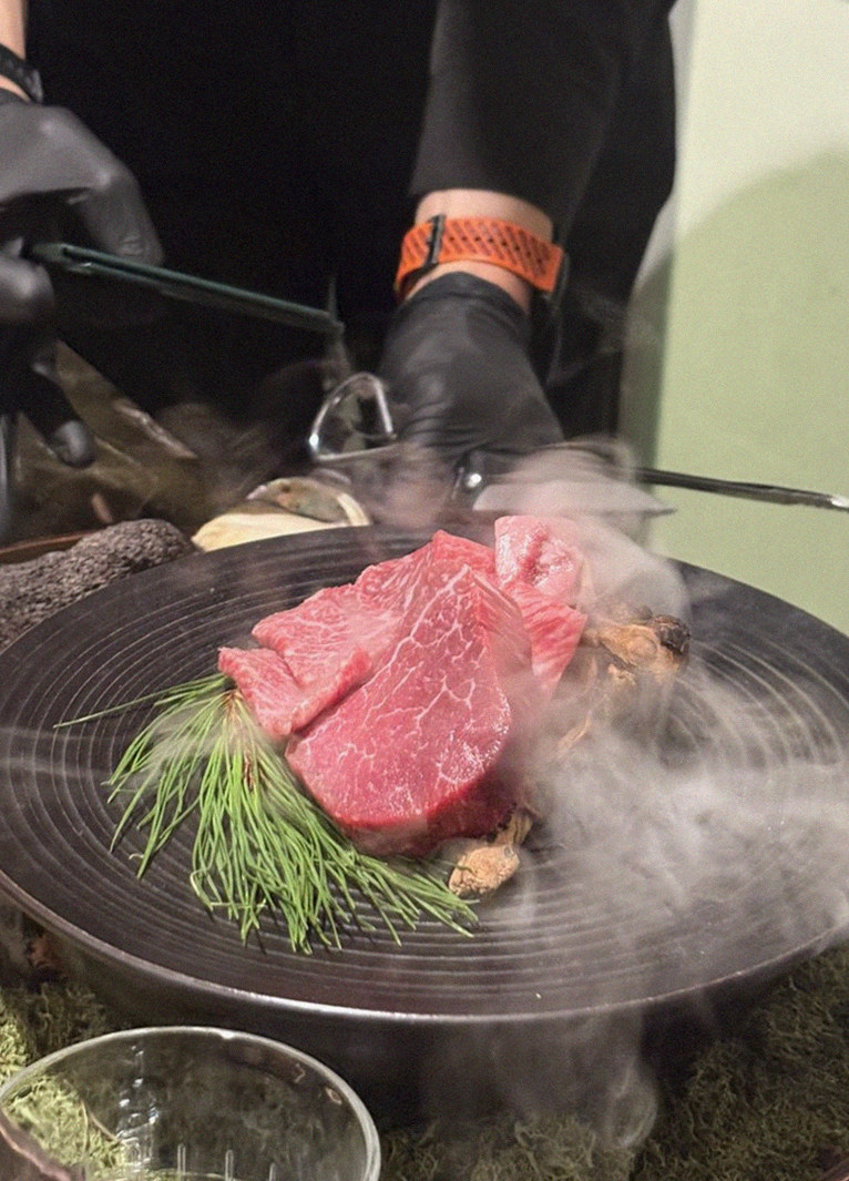 DAEBOJUNG City Hall · the signature Hanwoo showing — marbled beef cuts and caviar presented in a display chest