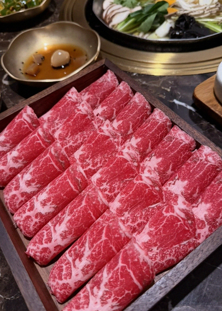 DAEBOJUNG City Hall · premium marbled Hanwoo beef presented before grilling