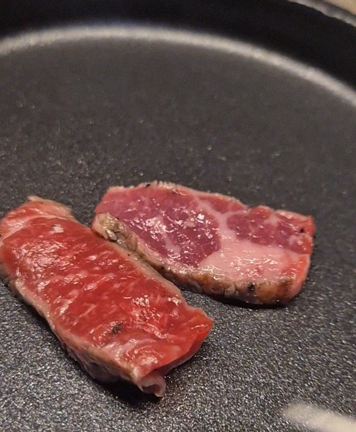 WOOARA Yeouido · premium marbled Hanwoo beef presented before grilling