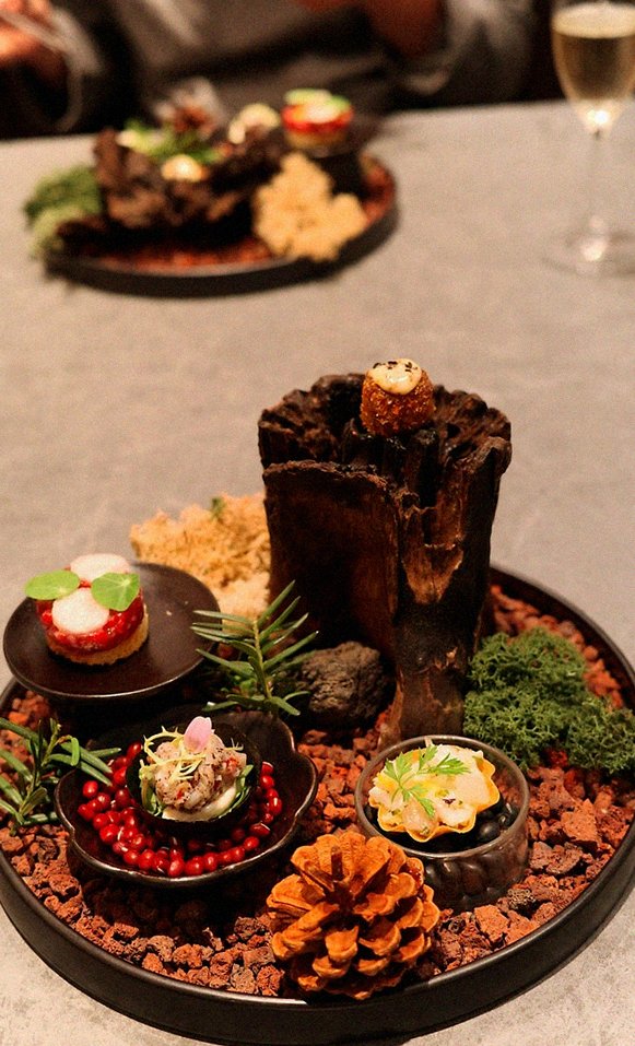 WOOHANA Jonggak · the signature Hanwoo showing — marbled beef cuts and caviar presented in a display chest