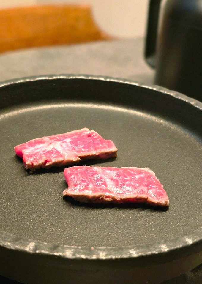 GOWOOGA Yeouido · premium marbled Hanwoo beef presented before grilling