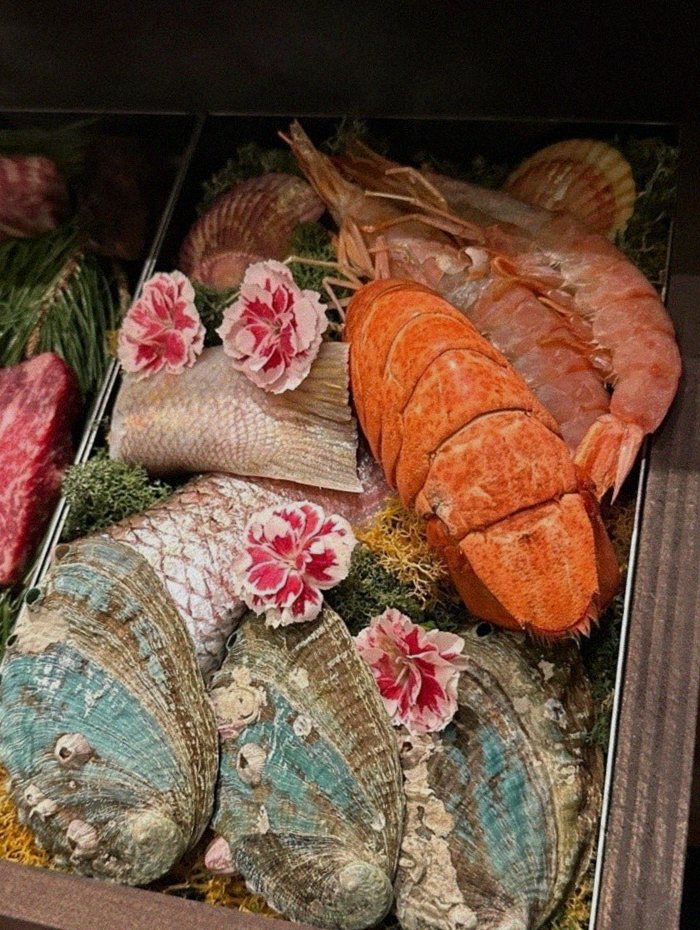 WOOHANA Yeouido · seafood course served alongside the beef