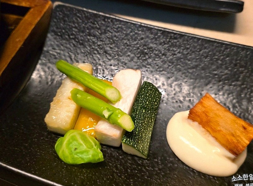 WOOARA Gwanghwamun · seafood course served alongside the beef