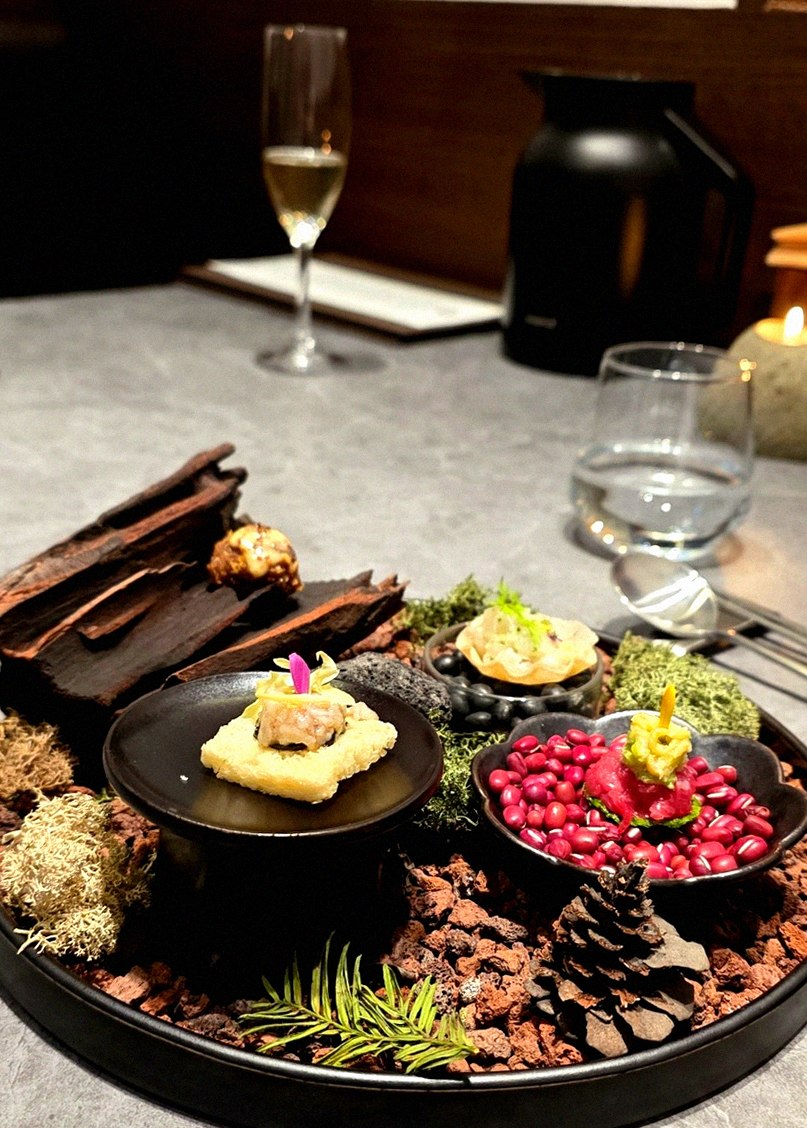 WOOHANA Jonggak · the signature Hanwoo showing — marbled beef cuts and caviar presented in a display chest