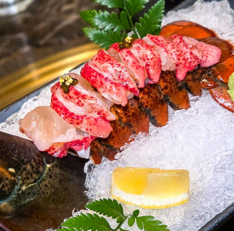 DAEBOJUNG Yeouido · the signature Hanwoo showing — marbled beef cuts and caviar presented in a display chest