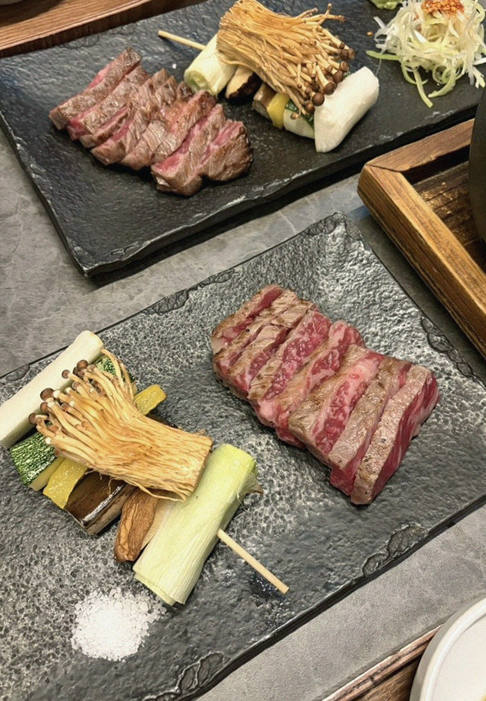 GOWOOGA Yeouido · premium marbled Hanwoo beef presented before grilling