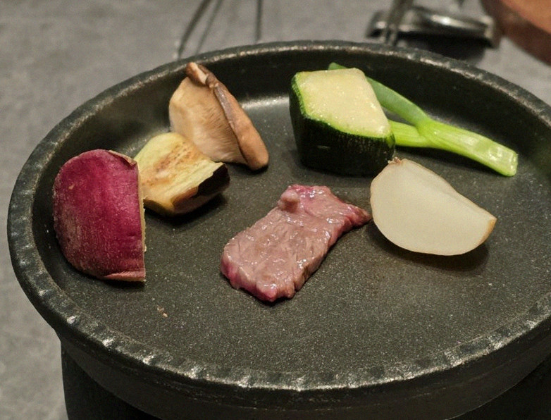 WOOHANA Jonggak · Hanwoo beef grilling over binchotan charcoal