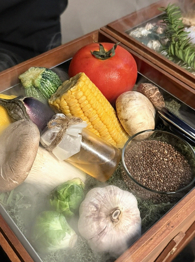 WOOARA Yeouido · the signature Hanwoo showing — marbled beef cuts and caviar presented in a display chest