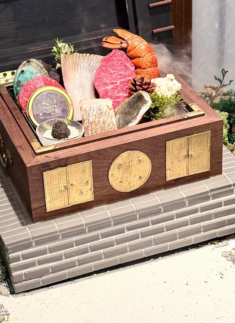 GOWOOGA Gangnam·Yeoksam · the signature Hanwoo showing — marbled beef cuts and caviar presented in a display chest