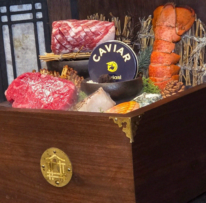 DAEBOJUNG Yeouido · the signature Hanwoo showing — marbled beef cuts and caviar presented in a display chest