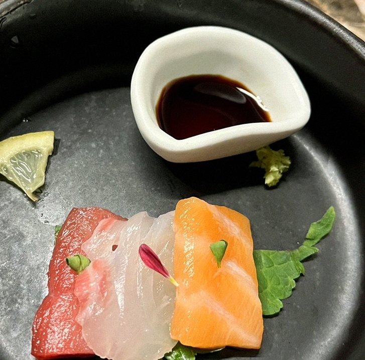 DAEBOJUNG Yeouido · seafood course served alongside the beef