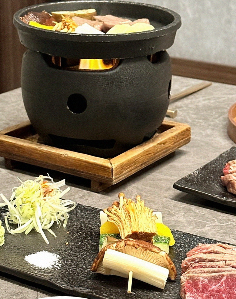 GOWOOGA Gwanghwamun · the signature Hanwoo showing — marbled beef cuts and caviar presented in a display chest