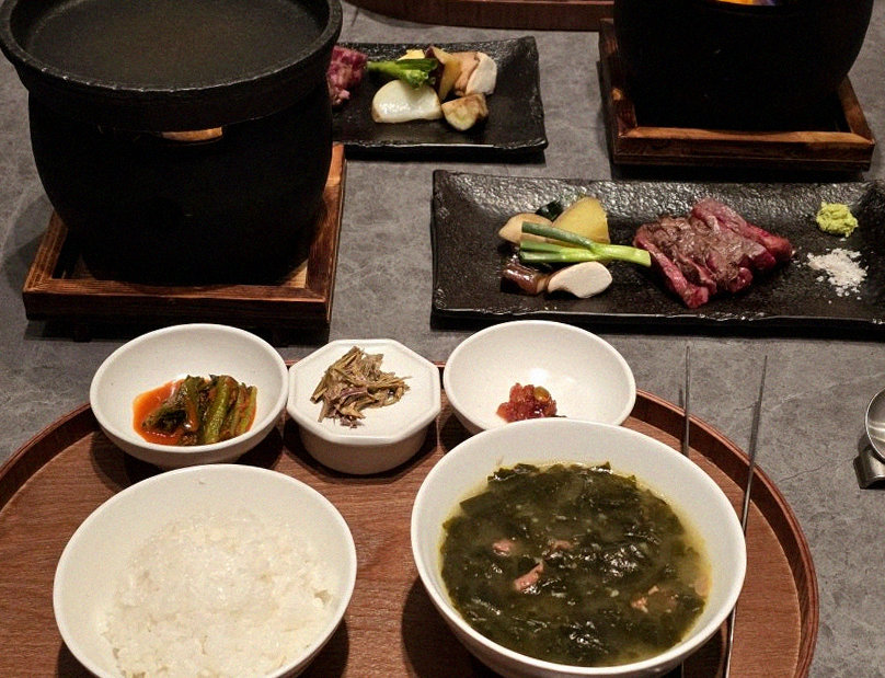 WOOHANA Jonggak · assorted Korean side dishes (banchan)