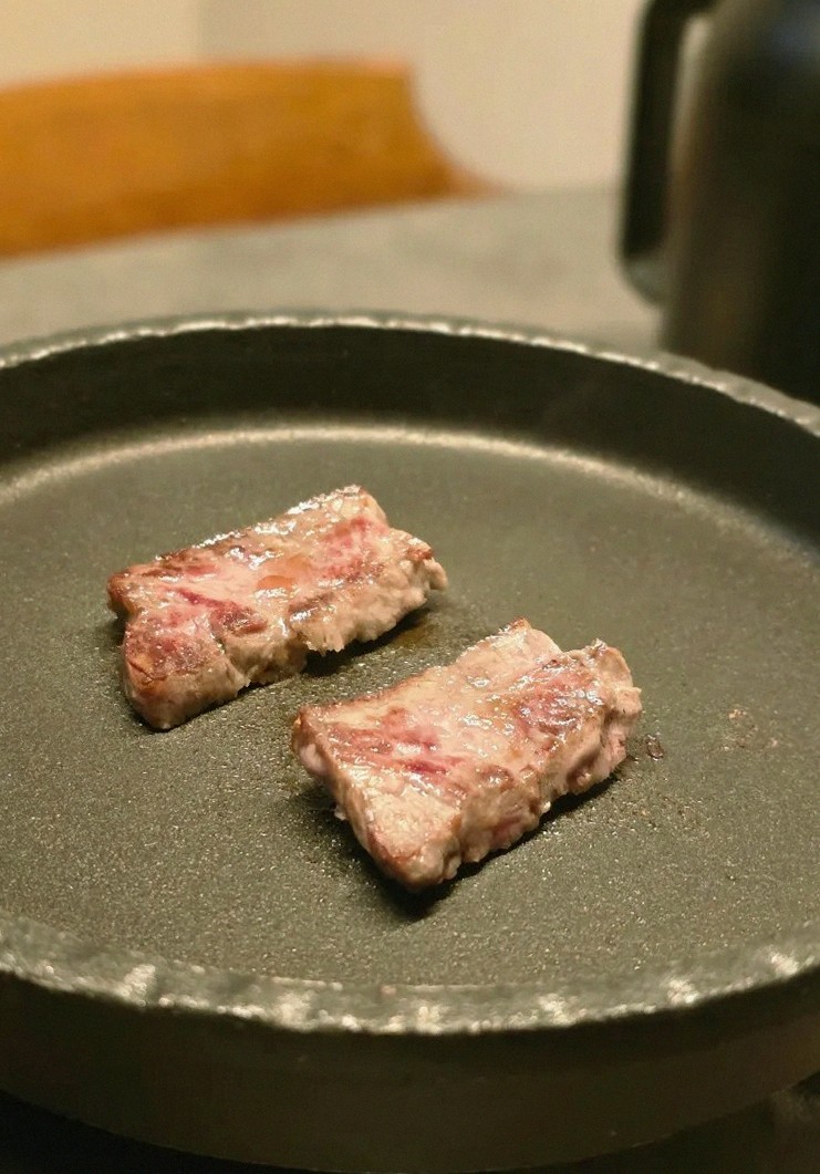 GOWOOGA Yeouido · premium marbled Hanwoo beef presented before grilling