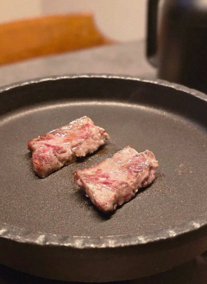 GOWOOGA Yeouido · premium marbled Hanwoo beef presented before grilling