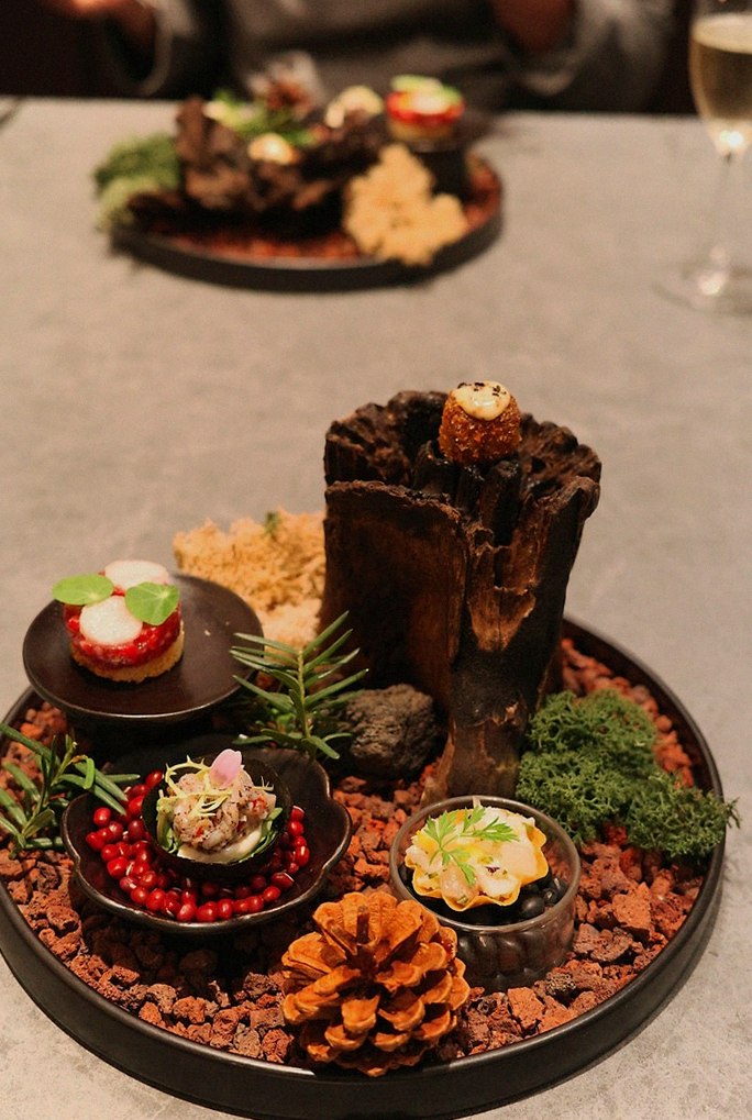 WOOHANA Jonggak · the signature Hanwoo showing — marbled beef cuts and caviar presented in a display chest