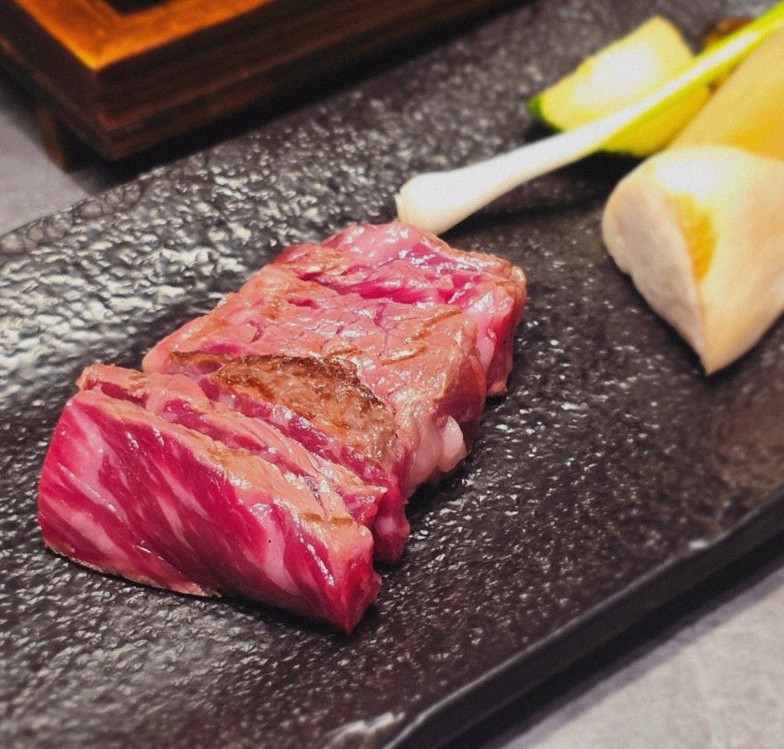 WOOHANA Jonggak · premium marbled Hanwoo beef presented before grilling