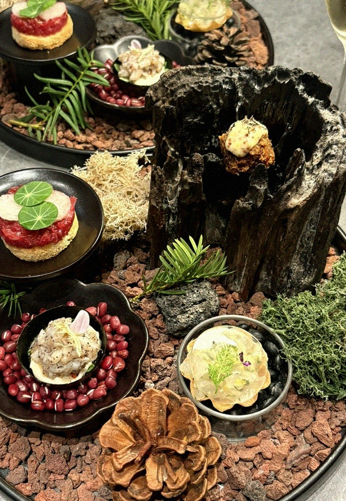 WOOHANA Yeouido · the signature Hanwoo showing — marbled beef cuts and caviar presented in a display chest