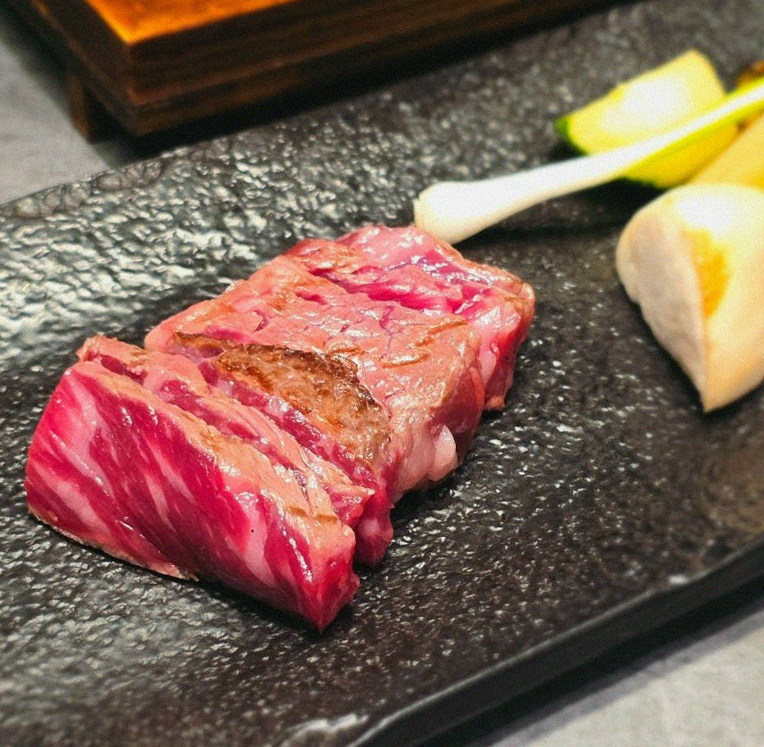 WOOHANA Yeouido · premium marbled Hanwoo beef presented before grilling