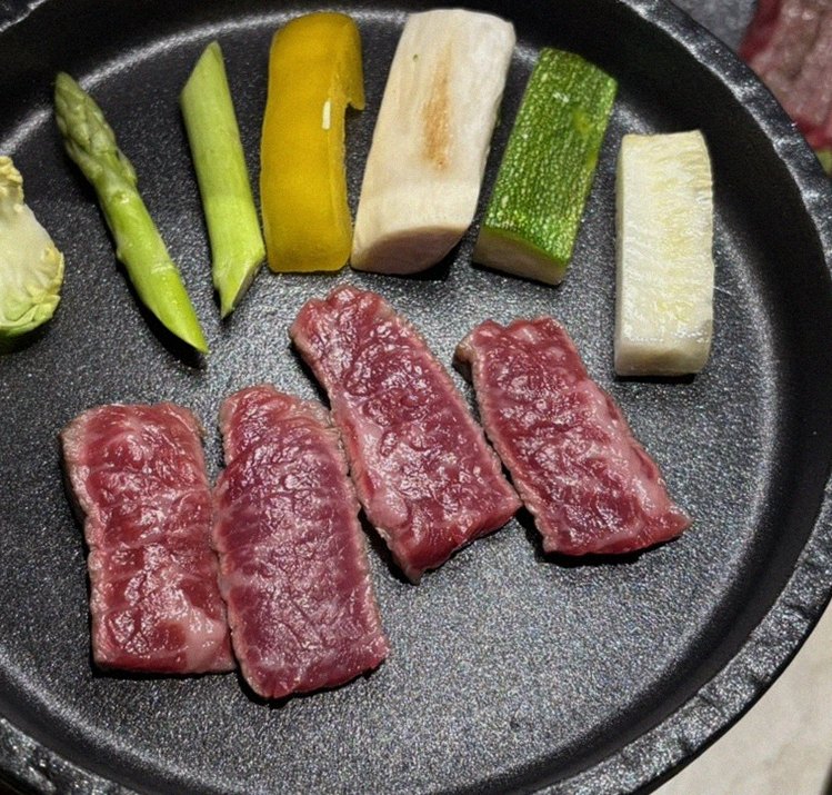 WOOARA Yeouido · premium marbled Hanwoo beef presented before grilling