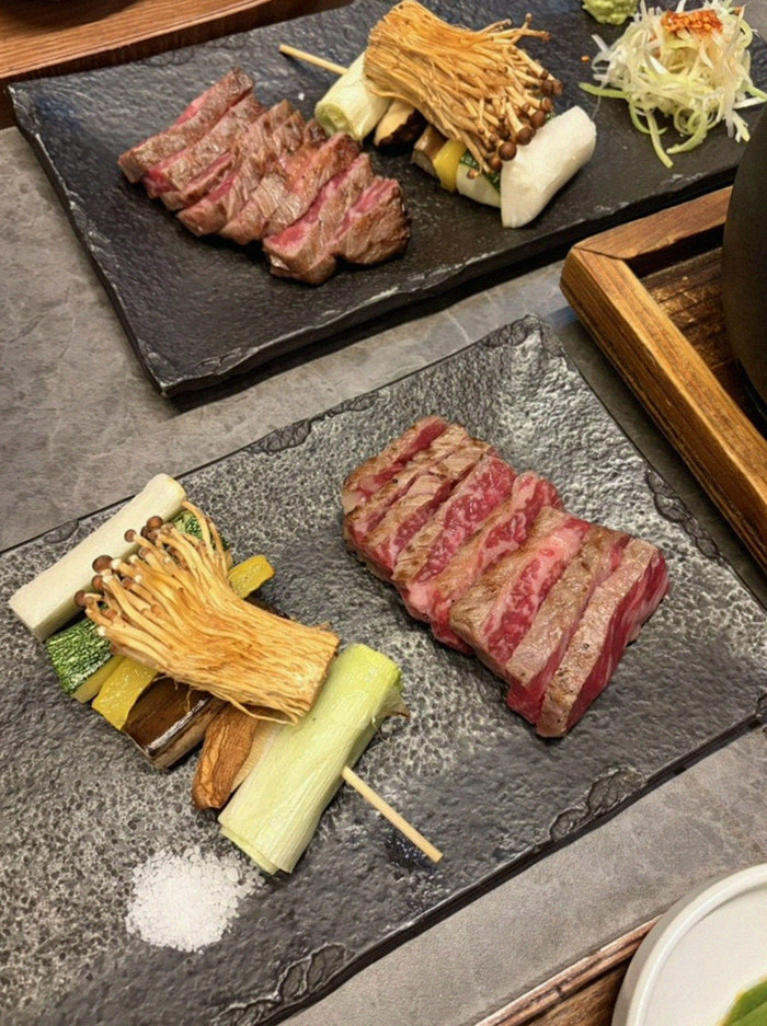 GOWOOGA Yeouido · premium marbled Hanwoo beef presented before grilling