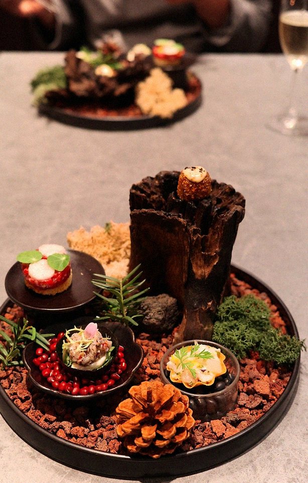 WOOHANA Yeouido · the signature Hanwoo showing — marbled beef cuts and caviar presented in a display chest