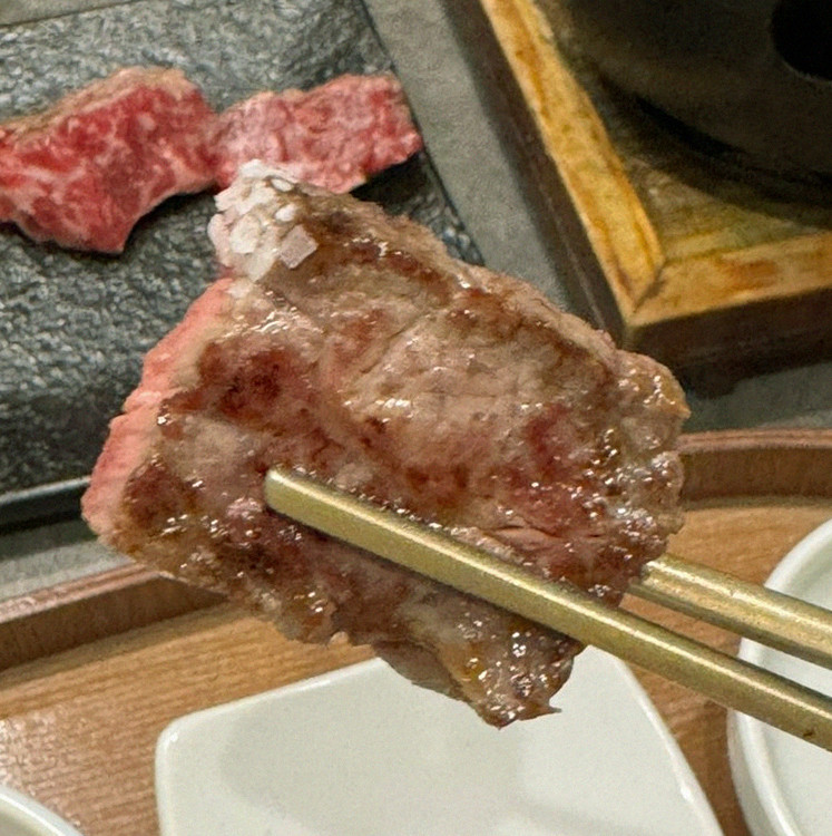 GOWOOGA Gwanghwamun · premium marbled Hanwoo beef presented before grilling