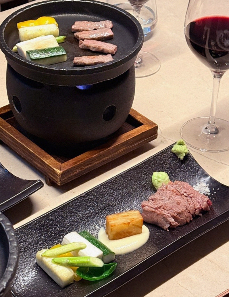WOOARA Gwanghwamun · the signature Hanwoo showing — marbled beef cuts and caviar presented in a display chest
