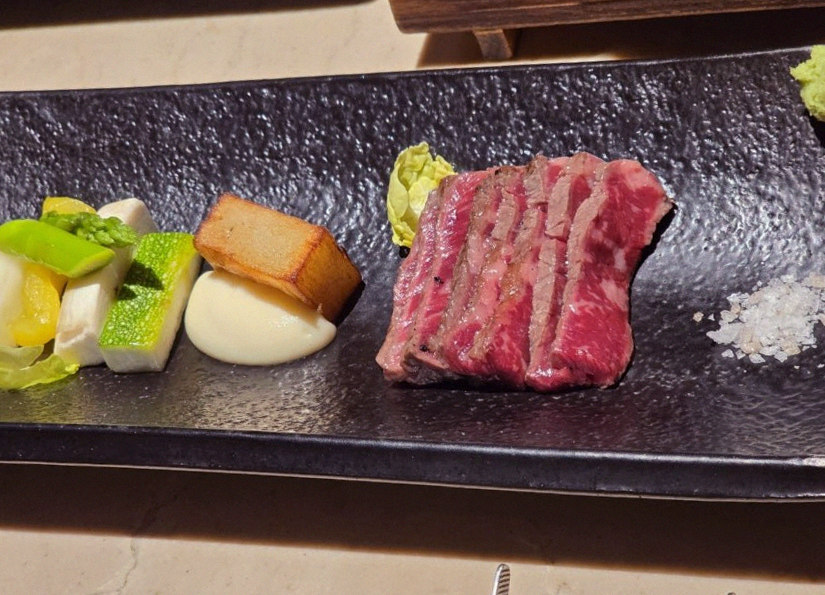 WOOARA Gwanghwamun · the signature Hanwoo showing — marbled beef cuts and caviar presented in a display chest